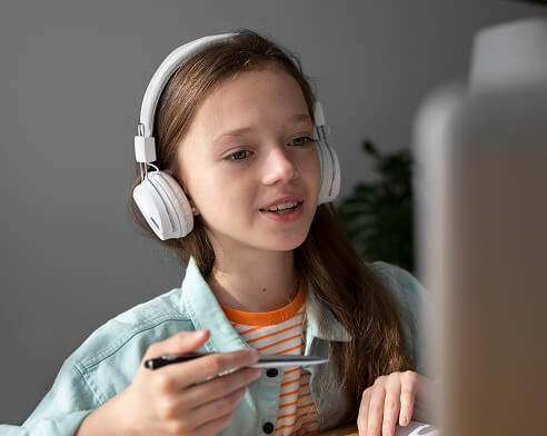 girl recording with laptop
